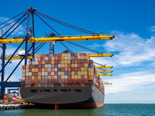 Container ship under gantry cranes