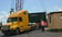 Truck and shipping container being offloaded at the Port of Belize, Belize City