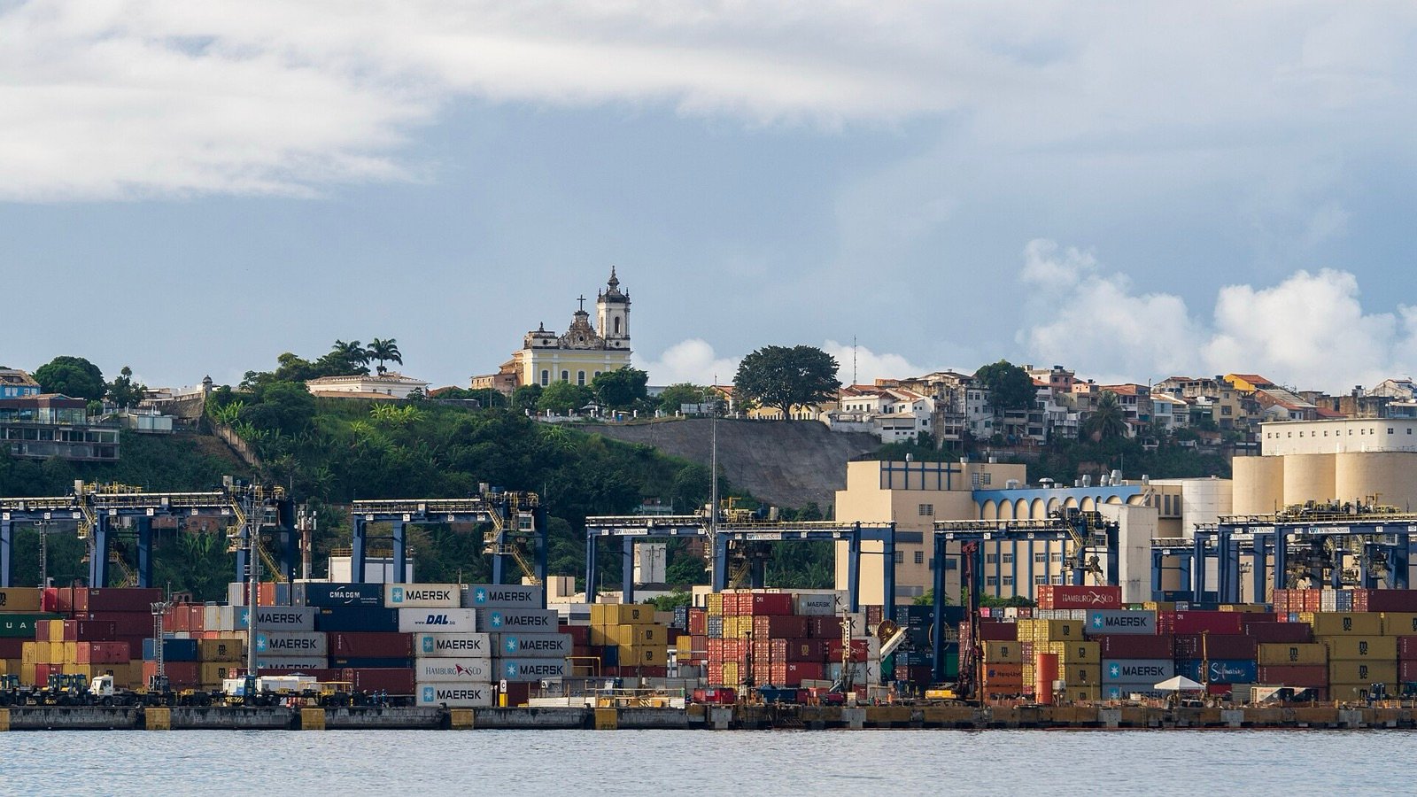 Container stacks and cranes at the cargo terminal of the Port of Salvador, Bahia, Brazil