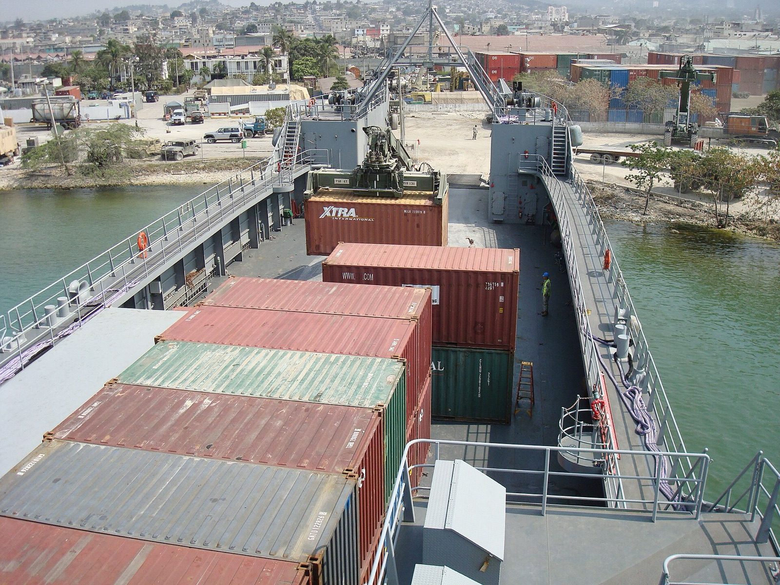 Shipping containers being offloaded at the port of Port-au-Prince, Haiti