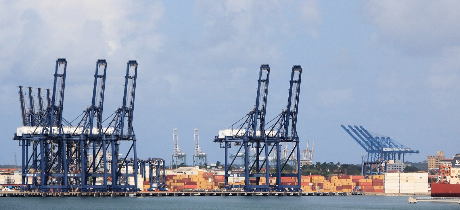 Container gantry cranes along the wharf at a container port in Colón, Panama