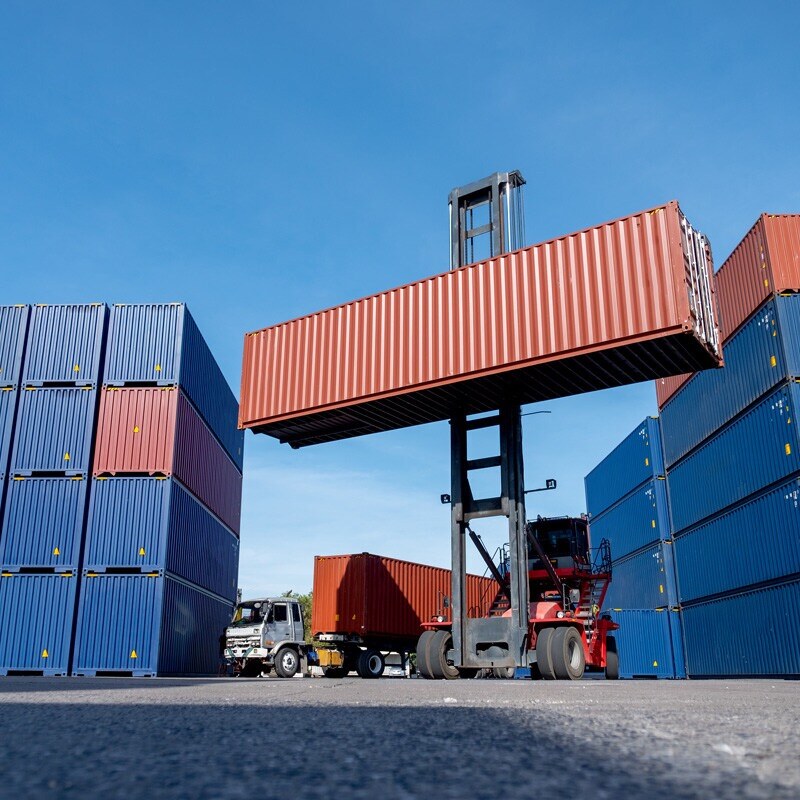 wide-shot-of-crane-truck-level-up-cargo-container-2023-11-27-05-32-51-utc