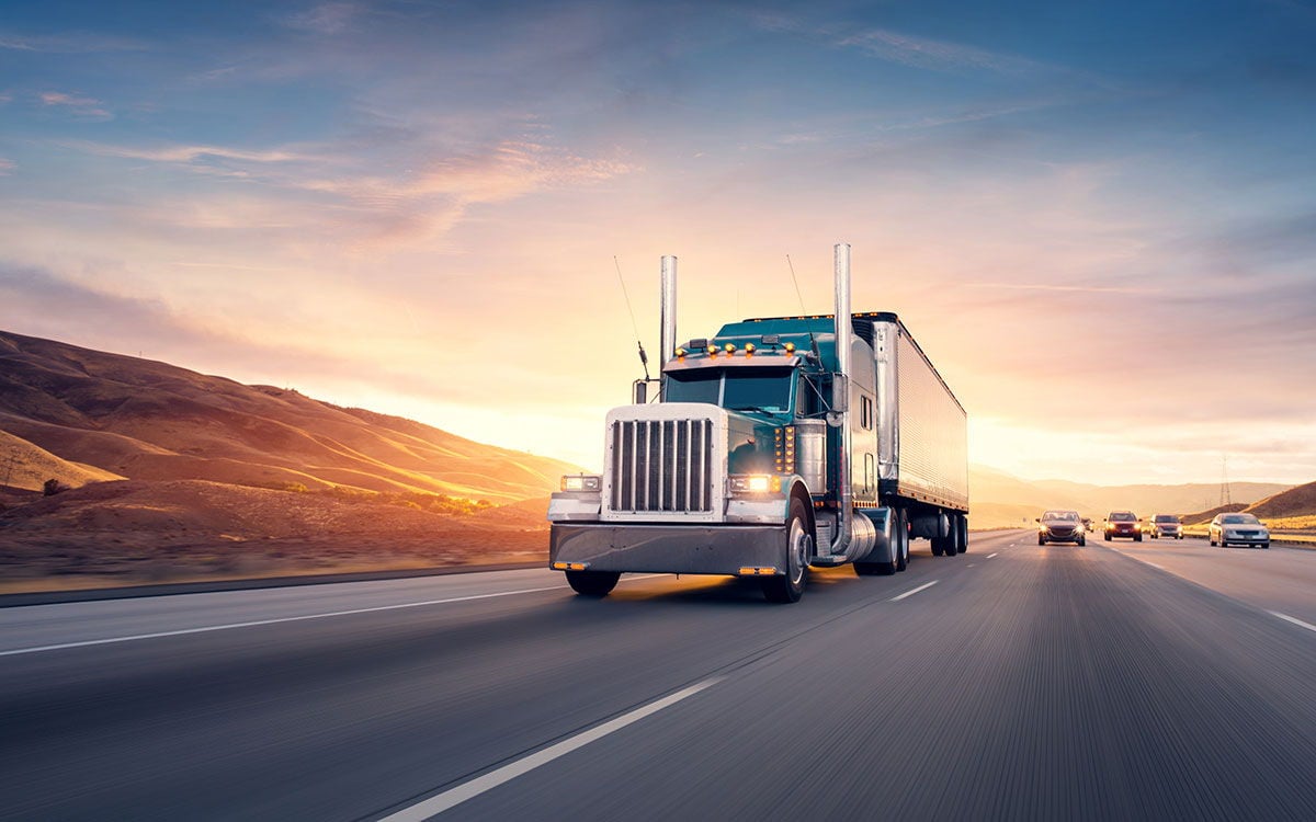 Moving truck on a long distance highway route