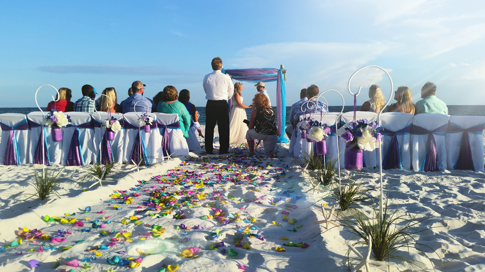 a-formal-beach-wedding-on-the-sandy-shore-of-flori-2023-11-27-04-51-13-utc